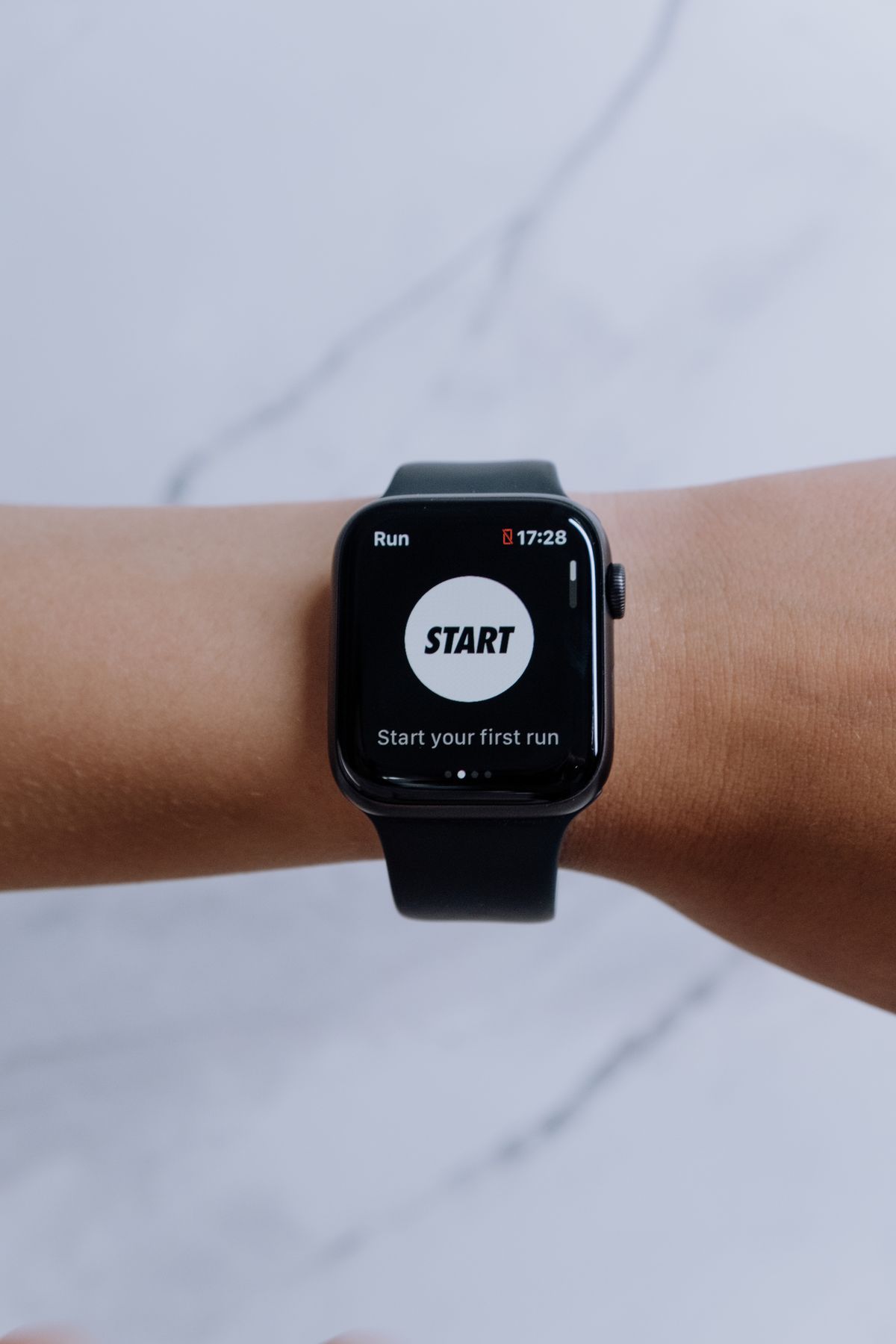 A smartwatch displaying a fitness app